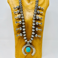 Squash Blossom made of dime beads and Turquoise Naja