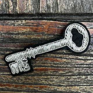 Silver Embroidered Key Brooch