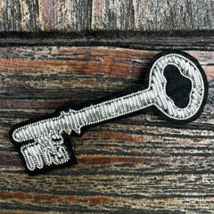 Silver Embroidered Picayune Key Brooch