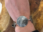 Graduated Coin Silver Link Bracelet